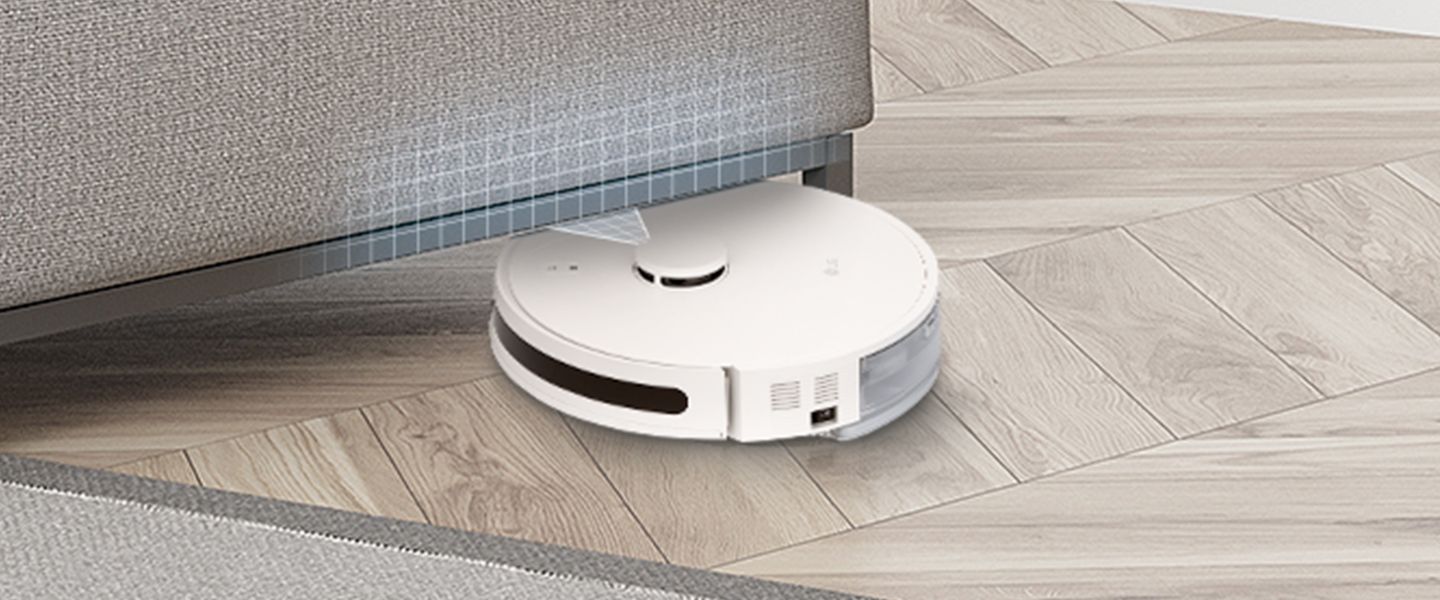 Robot vacuum detects an obstacle while being pressed against the sofa.