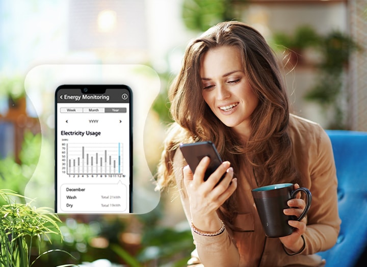 A woman monitoring her energy usage through a ThinQ app	