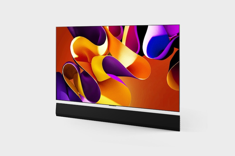 Slightly-angled left-facing side view of LG OLED evo TV, OLED G4 on the wall with the Soundbar below