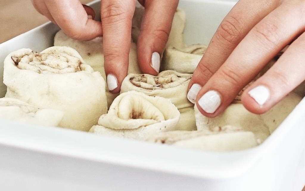 Pumpkin spice is poured into the butter to create pumpkin spiced cinnamon rolls in the LG NeoChef Countertop Microwave Oven