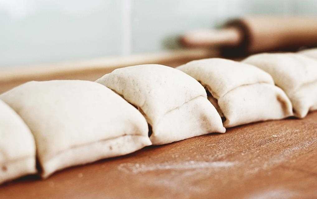 Pumpkin spice is poured into the butter to create pumpkin spiced cinnamon rolls in the LG NeoChef Countertop Microwave Oven