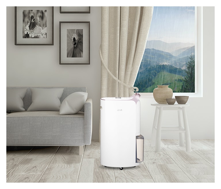 Menampilkan warna white rose gold yang elegan dari Dehumidifier LG Puricare™ yang ditempatkan di ruang tamu modern.