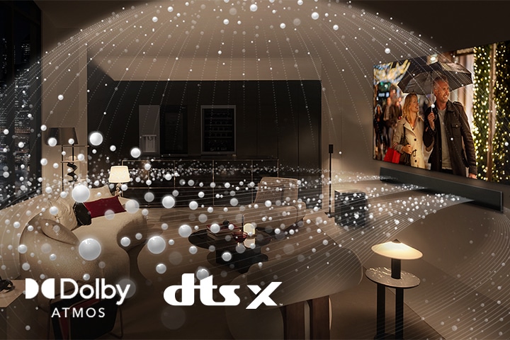 A movie plays on an LG OLED TV and LG Soundbar in a modern city apartment in a side angle view. White beads depicting sound waves project upwards and downwards from the Soundbar and TV, creating a dome of sound in the space.  Dolby Atmos logo DTS X logo