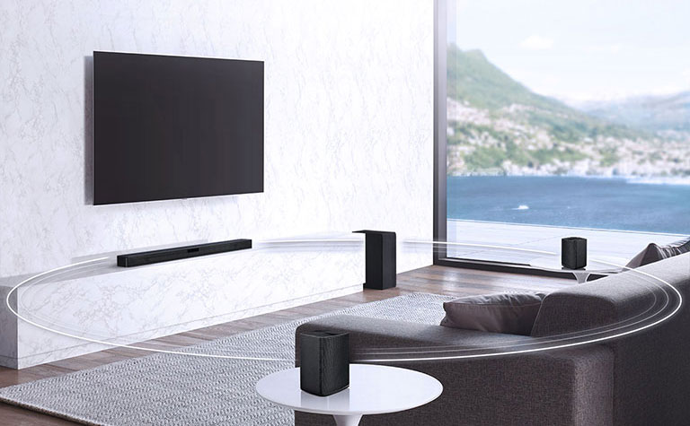 LG SNC4R Image of a living room with home theatre set up