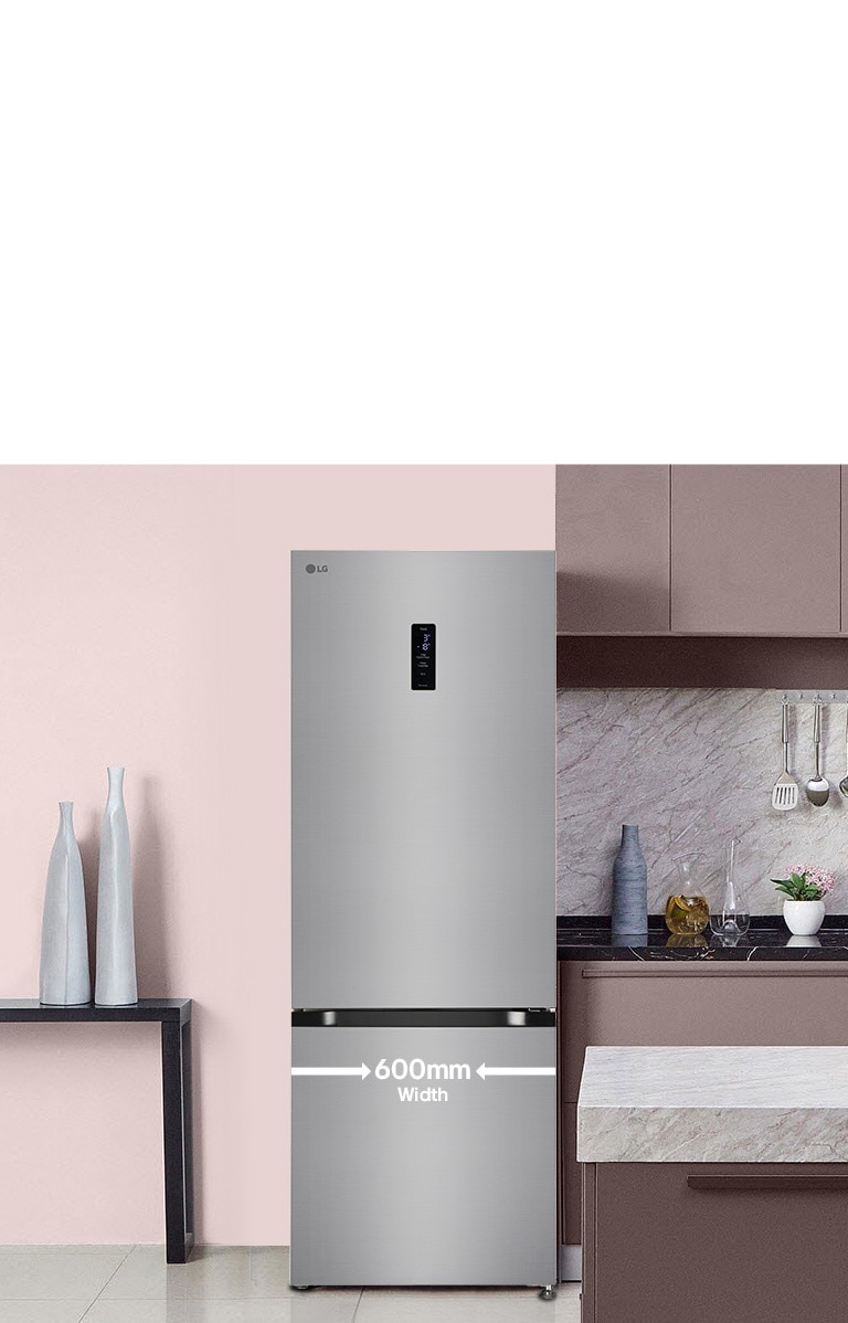 A close-up view of a kitchen featuring a sleek refrigerator, showing its 600mm width and modern design within the space.