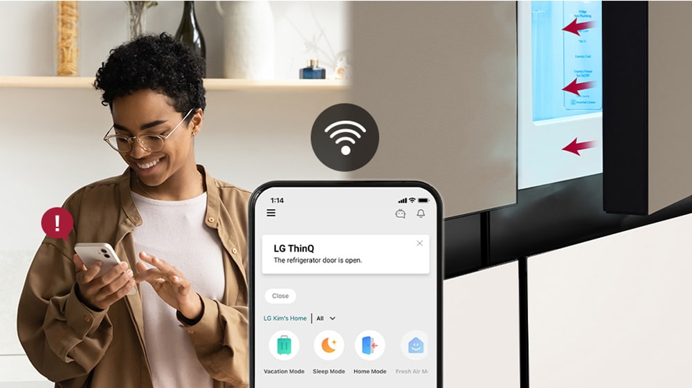 The image on the left shows the woman cooking.The image on the right shows that the refrigerator door has been left open. In the foreground of the two images is the phone screen which shows the LG ThinQ app notifications and the Wifi icon above the phone.