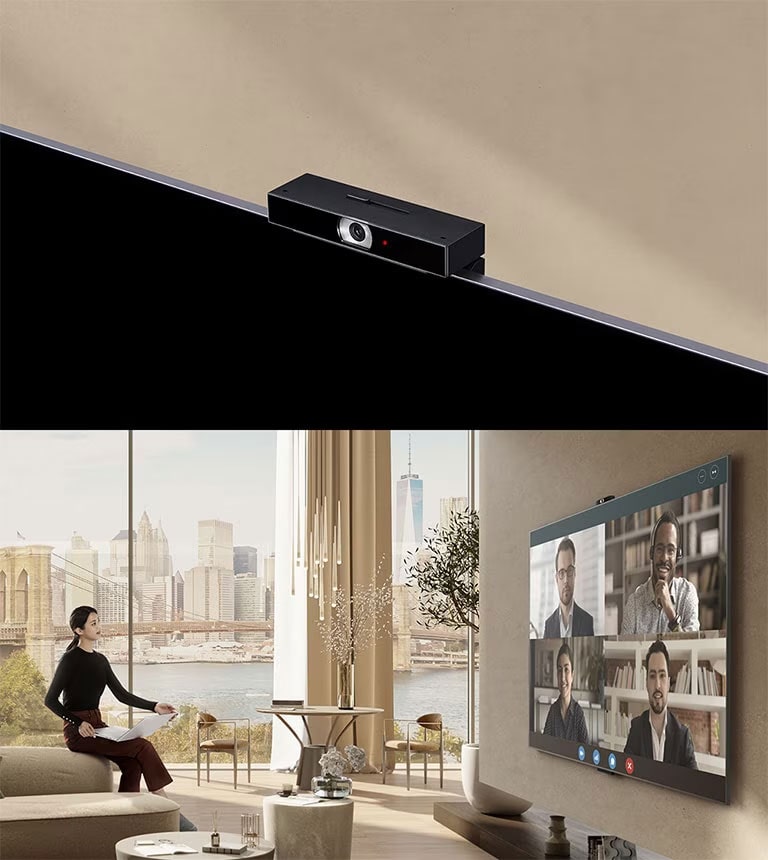 LG-65UR7550PSC-A woman is sitting on an armrest of a sofa, holding a laptop and watching TV. Inside the TV on the big screen, you can see four characters and a video conference.