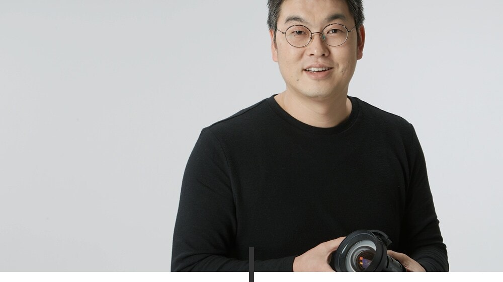 Lens Developer Heechul Shin with Clever Plans of Optical Lens Developer