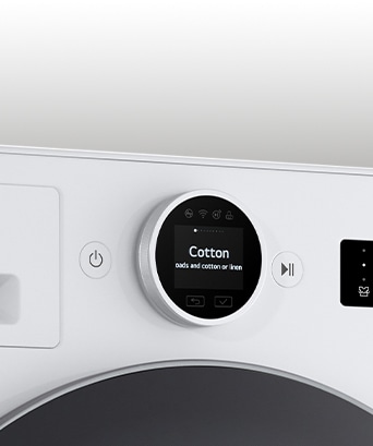 Dettaglio della manopola della lavatrice.