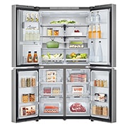 Frigorifero aperto completamente pieno di alimenti