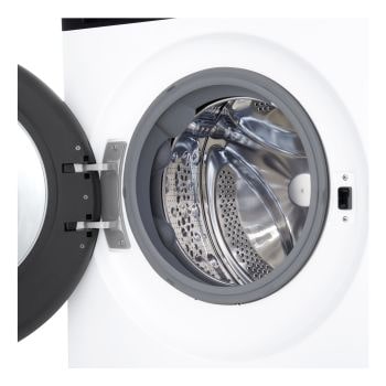 Interno del cestello in acciaio inox della lavatrice LG F4NX5009TKB con oblò aperto