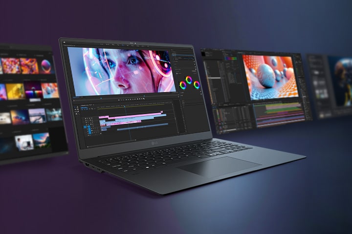 Viene presentato un elegante computer portatile con una vivace interfaccia di editing video sullo schermo, circondato da schermi aggiuntivi che mostrano vari flussi di lavoro creativi.