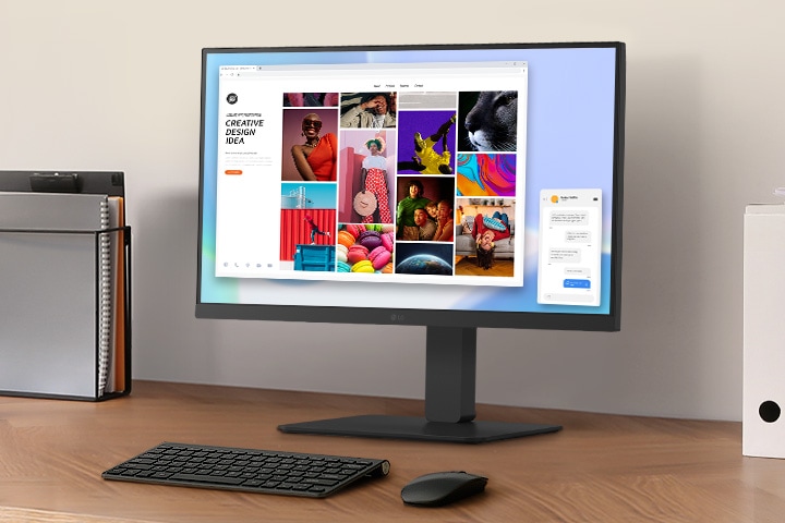 Un espacio de trabajo en un escritorio con monitor y portadocumentos.