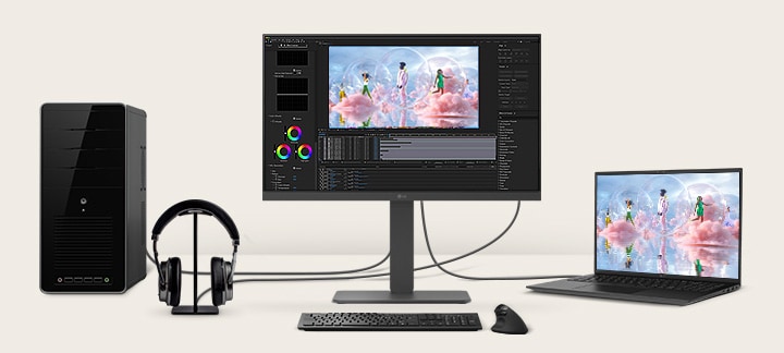 Vista frontal mostrando una estación de trabajo con múltiples dispositivos conectados al monitor.