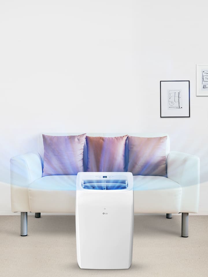Aire acondicionado portátil LG enfriando una sala de estar con sofá y planta, con enfriamiento potente y avanzado.