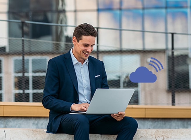 An image shows a man using a laptop to work remotely from a network-connected location, emphasizing LG ConnectedCare's accessibility.