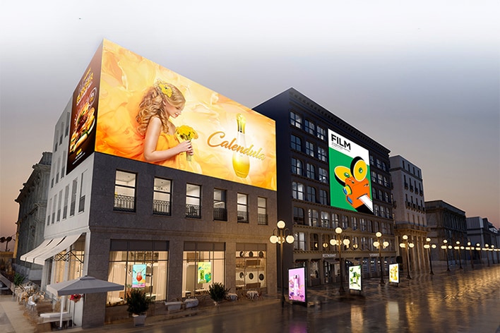 This image depicts various signage products installed outdoors, each showing different content.