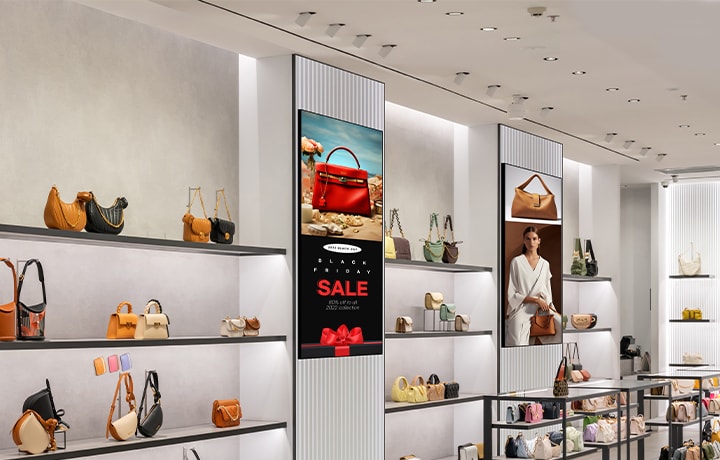 This image features several displays in a fashion retail store, each showing different content using PBP functionality.