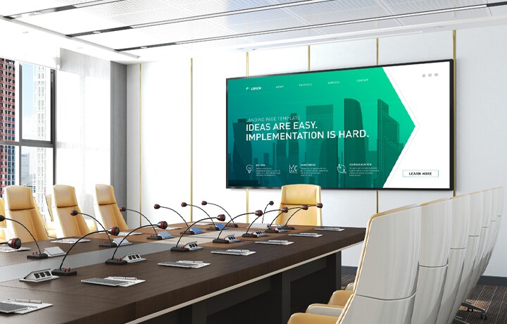 This image depicts a meeting room equipped with a display.