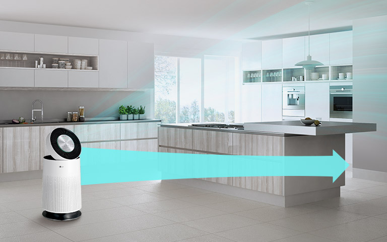 The air purifier is sitting on the left side of the screen in a kitchen. Clean air flows out of the machine and is shown to reach 7.5 meters out at a rate 24% than other machines.