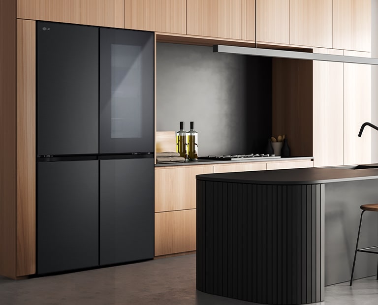 Modern kitchen interior with InstaView fridge.