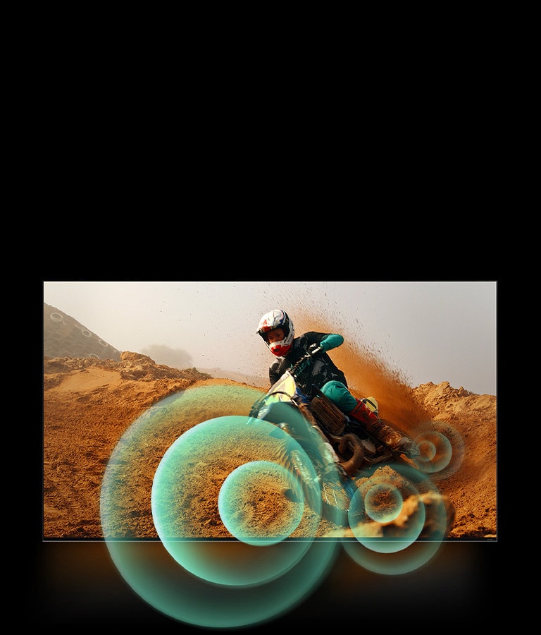 An image of a man riding a motorbike on a dirt track with bright circle graphics around the motorbike.