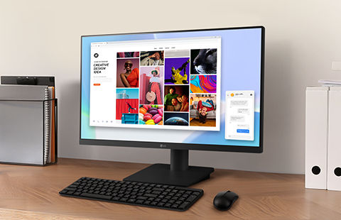 On the desk, there's an FHD monitor along with a keyboard and mouse. The screen displays a search for stock images.
