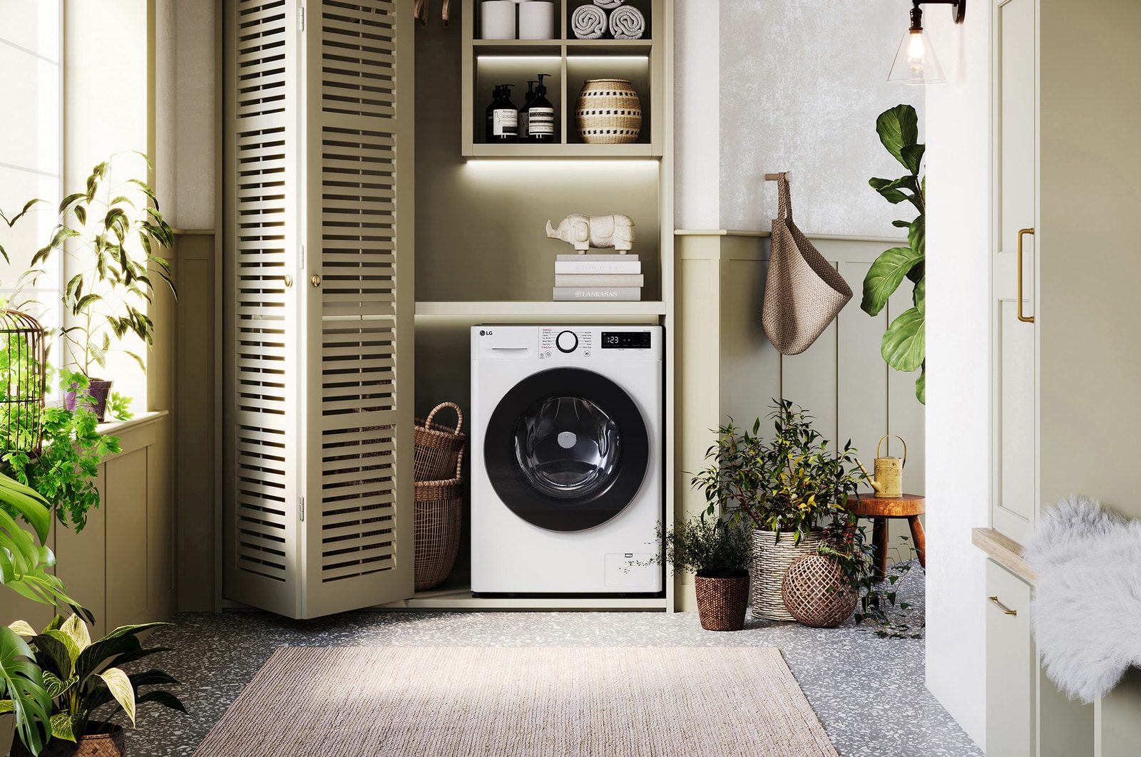 De witte LG 9 kg wasmachine GD3R509S0 met zijn strakke design, netjes geïnstalleerd onder het aanrecht van een moderne wasruimte.