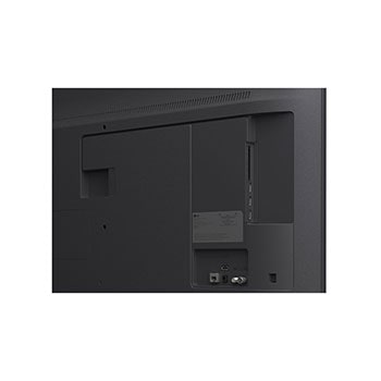 LG TV with an impressively large screen mounted on a wall above a LG Soundbar in a modern style living room.