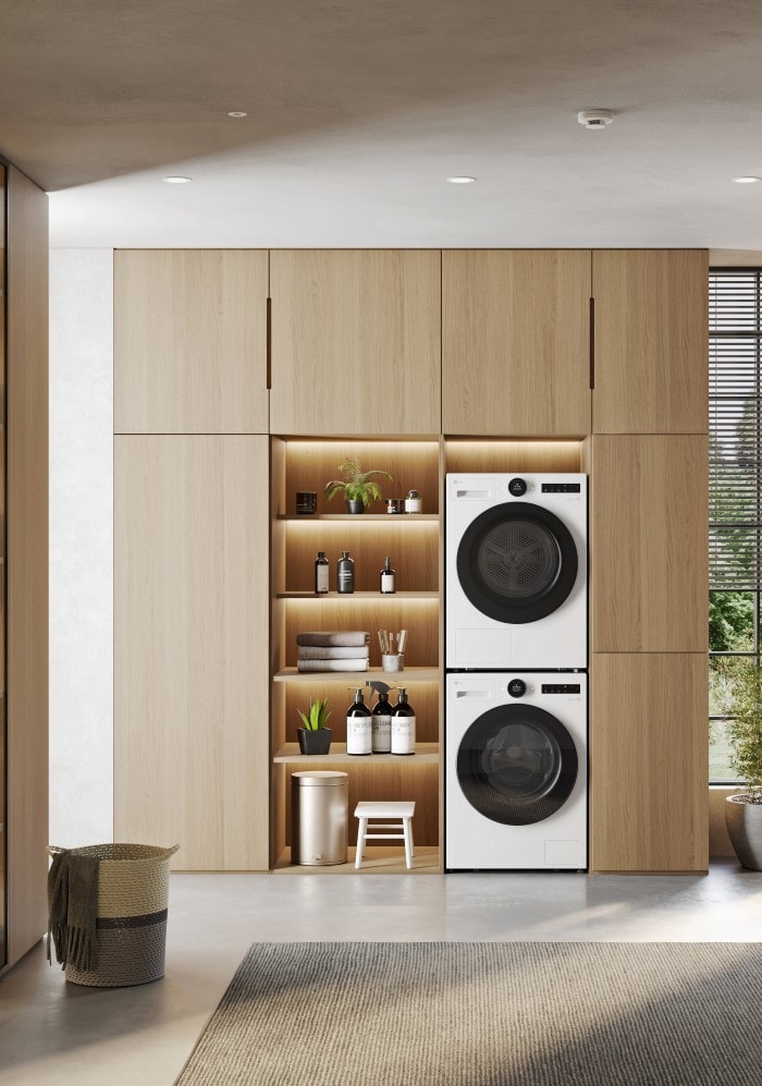 This is an image of a washing machine placed in a laundry room.