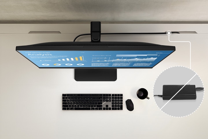 Bovenaanzicht dat de strakke indeling van het werkstation laat zien door middel van een ingebouwde stroombron.