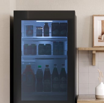 The InstaView window is illuminated to reveal the contents of the fridge.