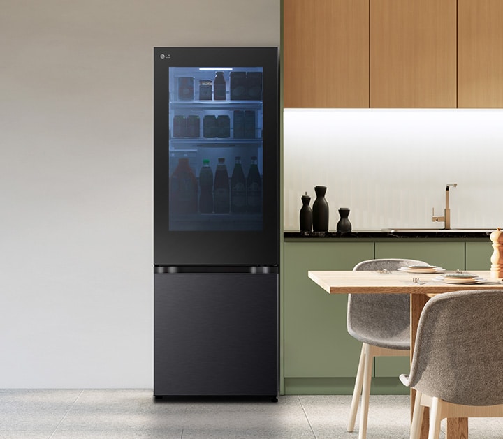 lg bottom freezer refrigerator with instaview in a modern kitchen..