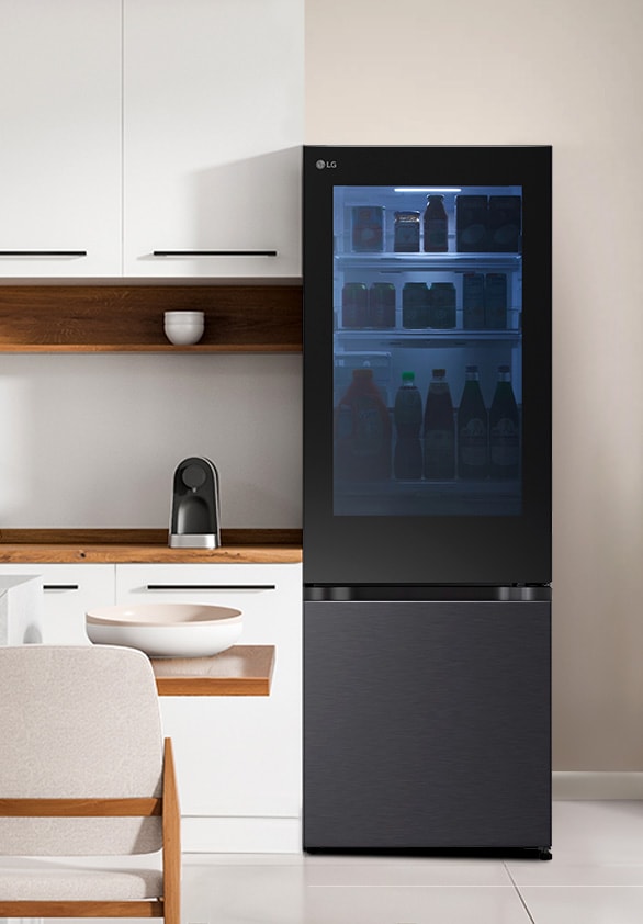 The front view of lg bottom freezer refrigerator with instaview in a white modern kitchen room.