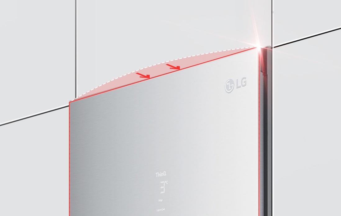 The top of the freezer is shown at an angle with two arrows pointing in toward the wall to indicate it is flush with the cabinets surrounding it.