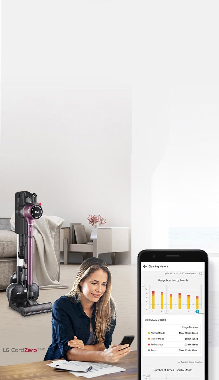 The vacuum in the charging stand is in a living room in the background with a woman looking at her phone in the foreground. An image of the phone screen shows the cleaning history of her product.