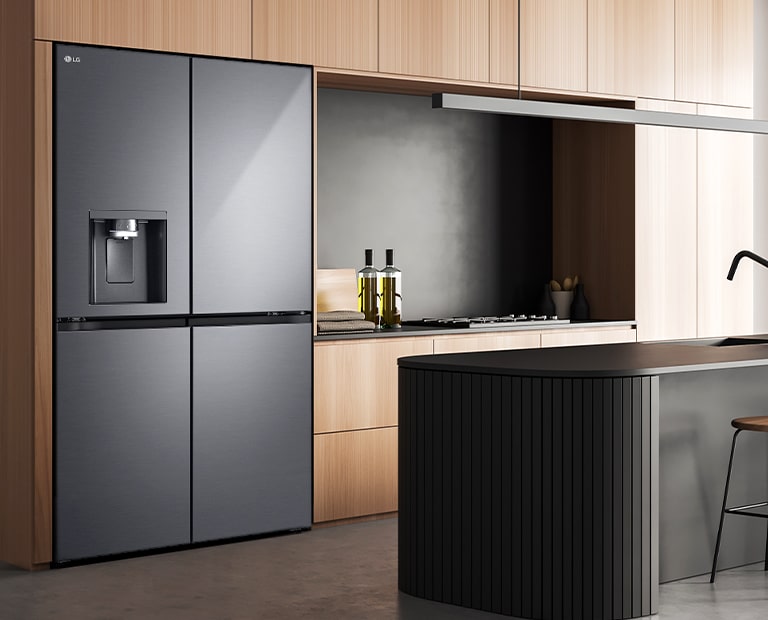 Modern kitchen interior with InstaView fridge.