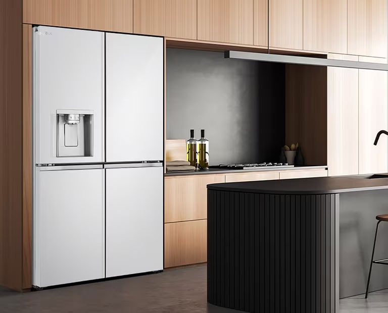 Modern kitchen interior with InstaView fridge.