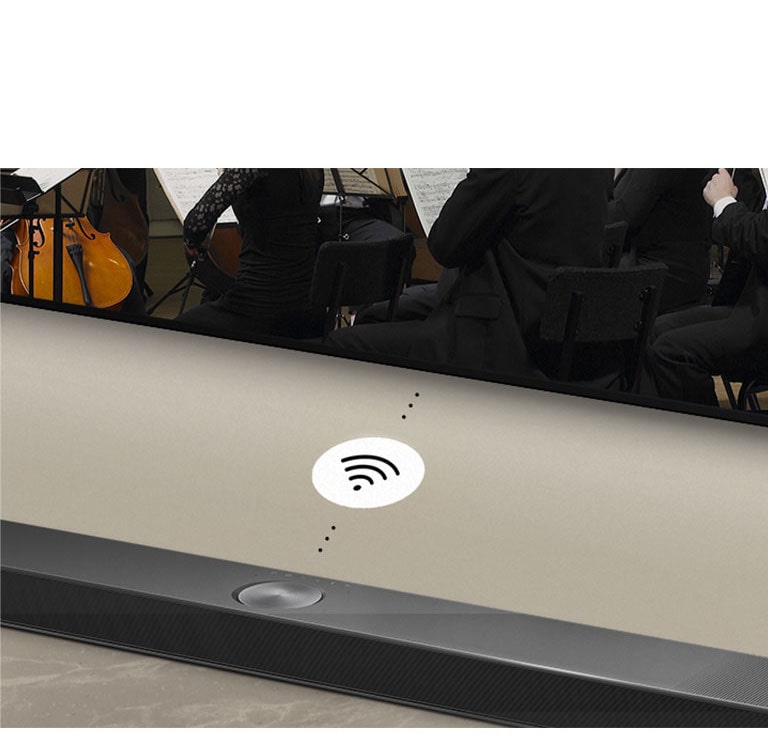 A close up image of an LG Soundbar below an LG TV. A connectivity symbol depicts WOWCAST's wireless operation.