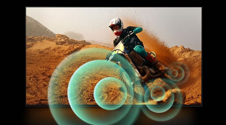 An image of a man riding a motorbike on a dirt track with bright circle graphics around the motorbike.