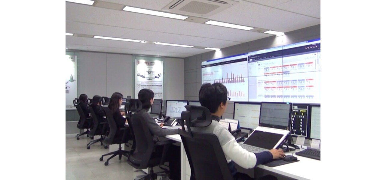 People working in the control room