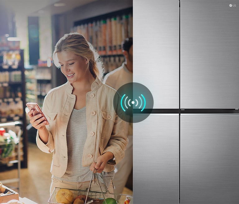 Image on the left shows a woman standing in a grocery store looking at her phone. Image on the right shows the refrigerator front view. In the center of the images is an icon to show connectivity between the phone and refrigerator.