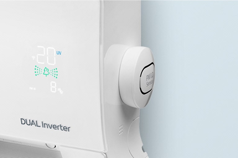 The side angle of the machine showing the PM1.0 Sensor and the air quality panel showing green for good quality air.