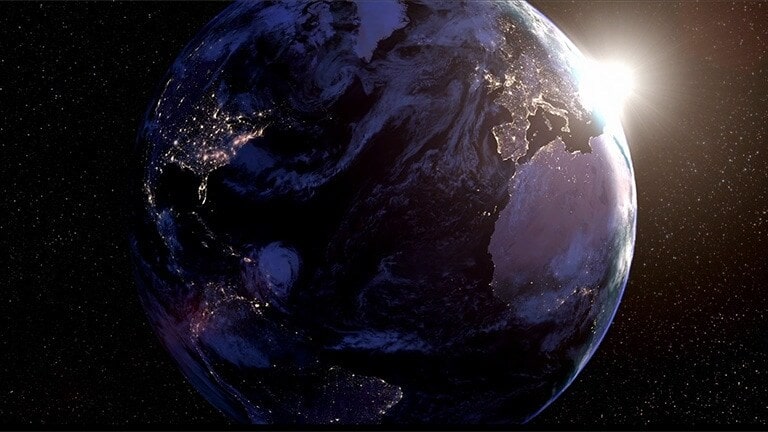 A big image of the Earth is situated in the middle, and a small star is twinkling beside it