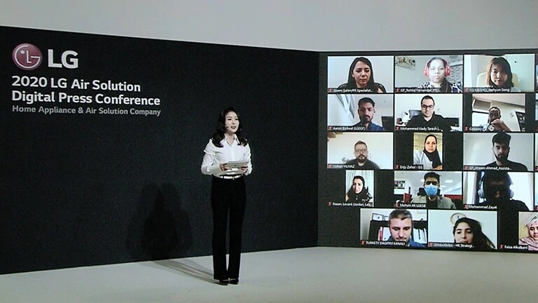 A group of conference participants on the online Center features a woman in a suit speaking. Right banner indicating its LG Air Solution Conference.