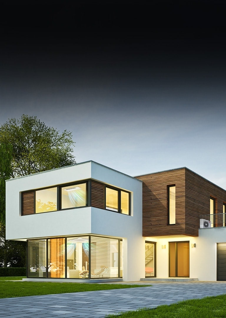 A house in white and wood tones. Both staircases feature ceiling-mounted air conditioning units with visible airflow. A front driveway with grass.