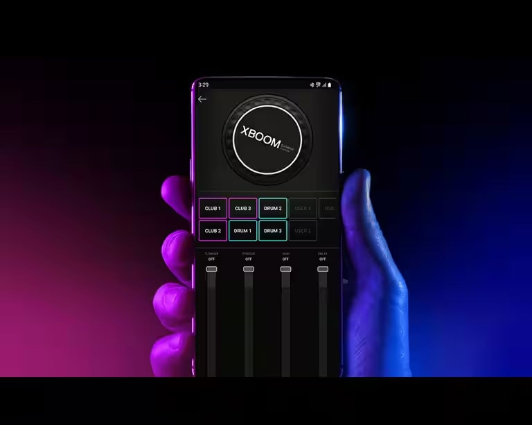 A hand is holding a smartphone, showing DJ app.