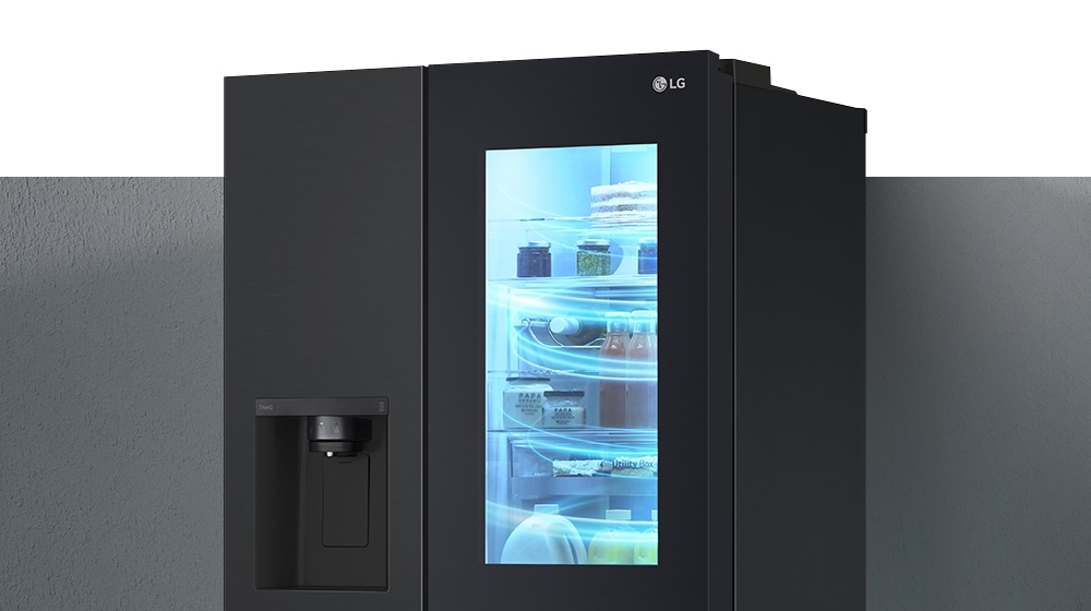 The half-side view of the InstaView refrigerator. This is a picture of a refrigerator filled with cold air.