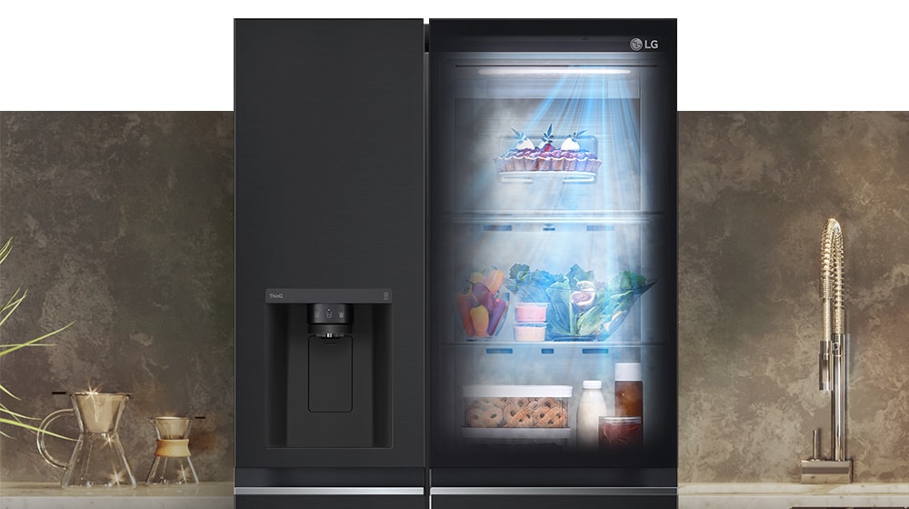 The front view of a black InstaView refrigerator with the light on inside. The contents of the refrigerator can be seen through the InstaView door. Blue rays of light shine down over the contents from the DoorCooling function.