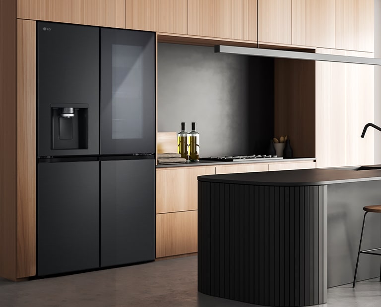 Modern kitchen interior with InstaView fridge.